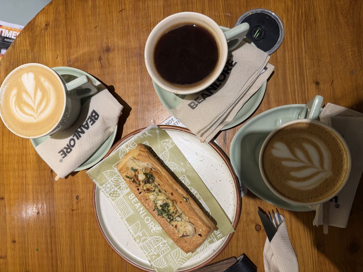 An americano, two mochas and a savoury puff at Beanlore